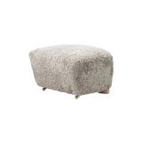 the tired man ottoman - sheepskin green tea