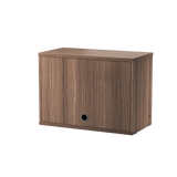 string system schank mit klapptür walnut 58/30